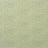 Fabric sample of a green and neutral printed linen fabric with a geometric pattern