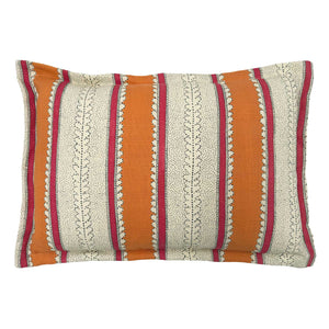 Linwood cushion in Dimty, in Fruit Salad colourway. Overhead view showing the full front design, featuring warm orange and raspberry red bands with subtle dots and dashes.