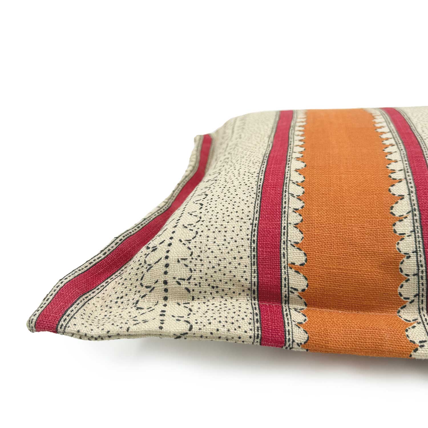Close-up side view of Linwood cushion in Dimity, Fruit salad colourway, showing fabric texture and Oxford edge detail.