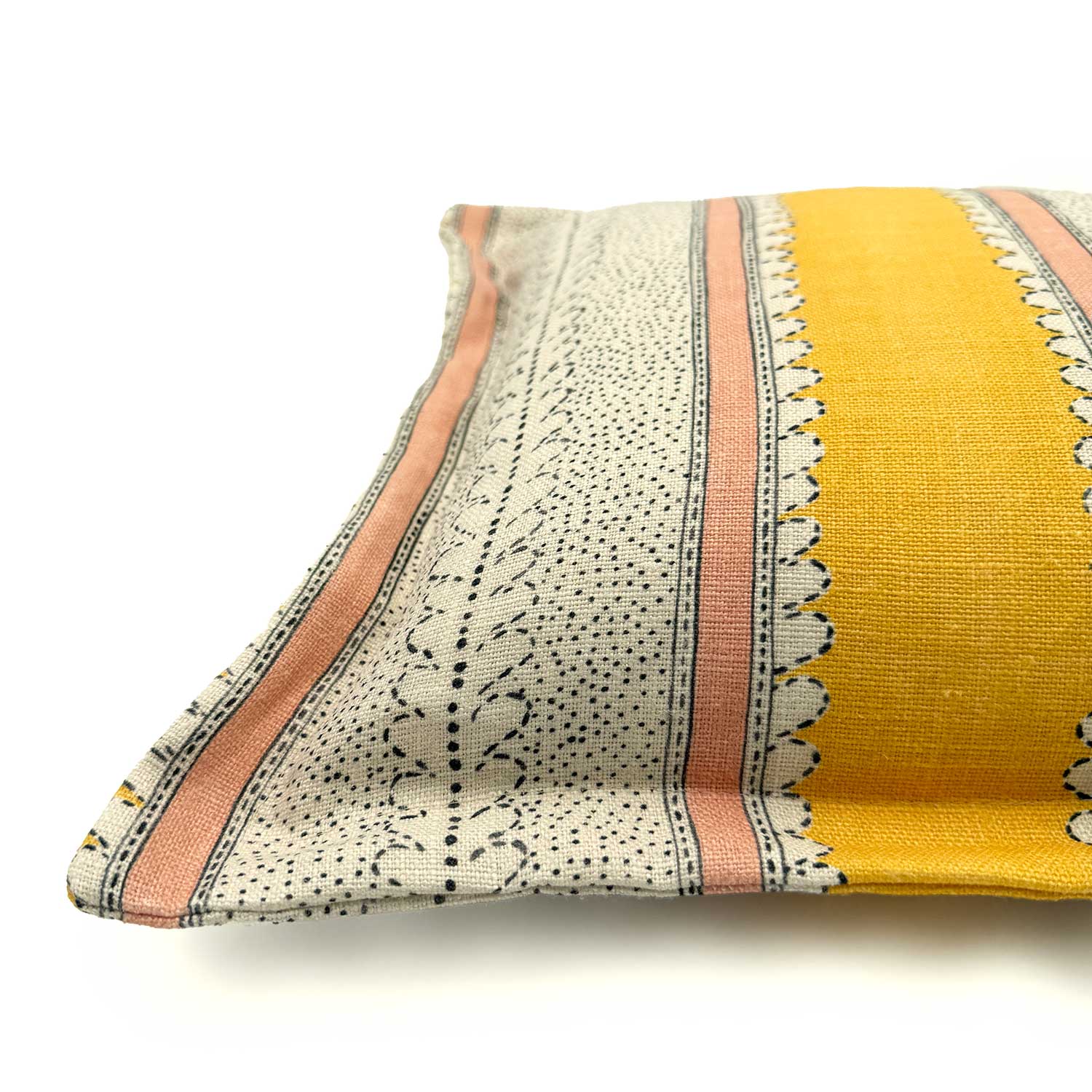 Close-up side view of Linwood cushion in Dimity, Mango colourway, showing fabric texture and Oxford edge detail.