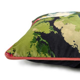 Close-up side view of Linwood cushion in Jungle Jive Navy, showing the fabric texture and contrast coral-red piping detail.