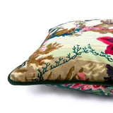 Close-up side view of Linwood cushion in Jungle Rumble Velvet Leopard, showing the fabric texture and contrast green piping detail.