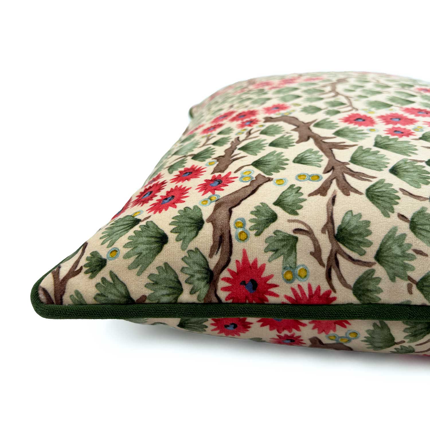 Close-up side view of Linwood cushion in Miyagi, Pink Green colourway, showing fabric texture and dark green piping detail.