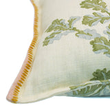 A multicoloured linen cushion with a oak-leaf motif pattern.