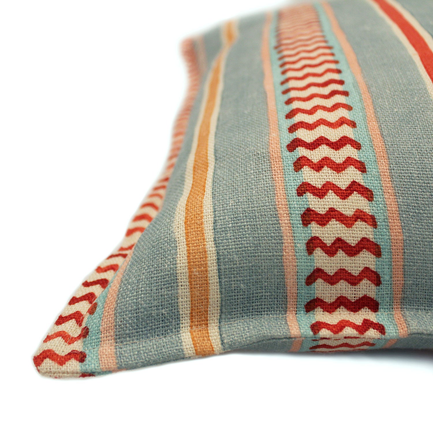 Cushion featuring vibrant yet casual pink and blues stripes on the front and back. Made from pure linen.