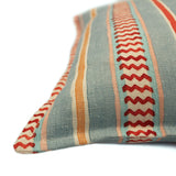 Cushion featuring vibrant yet casual pink and blues stripes on the front and back. Made from pure linen.