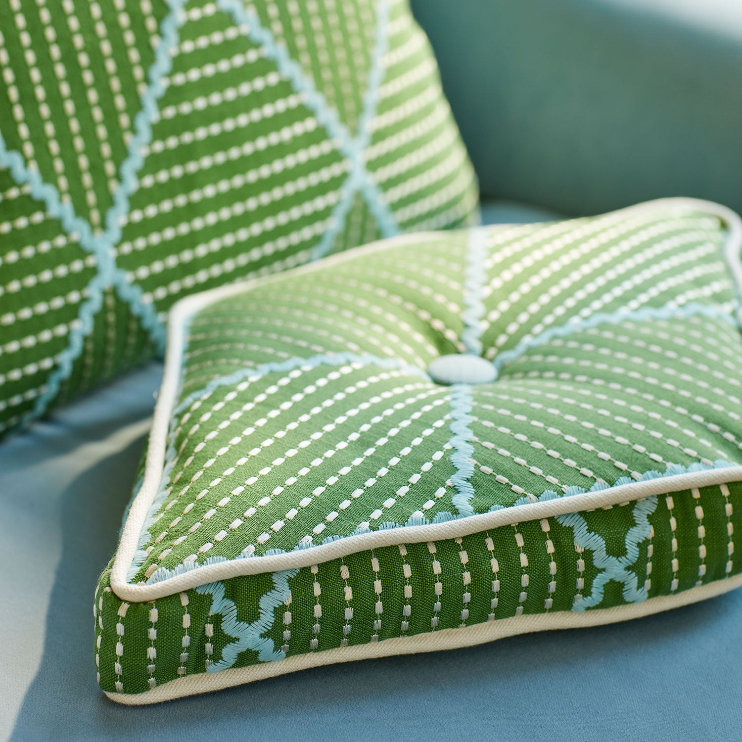 Geometric green cushions.