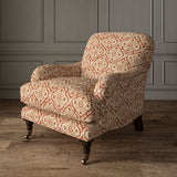 Armchair covered in a linen print with a handcrafted feel in red