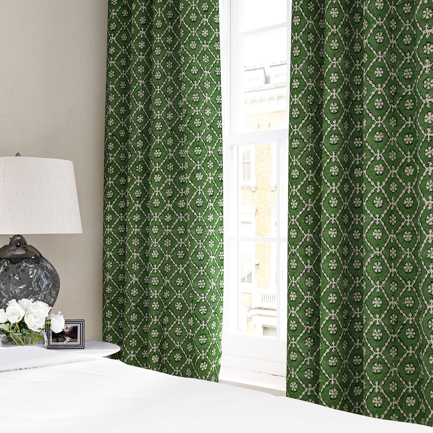 Linen curtain with a hand block-style pattern in green, black and cream