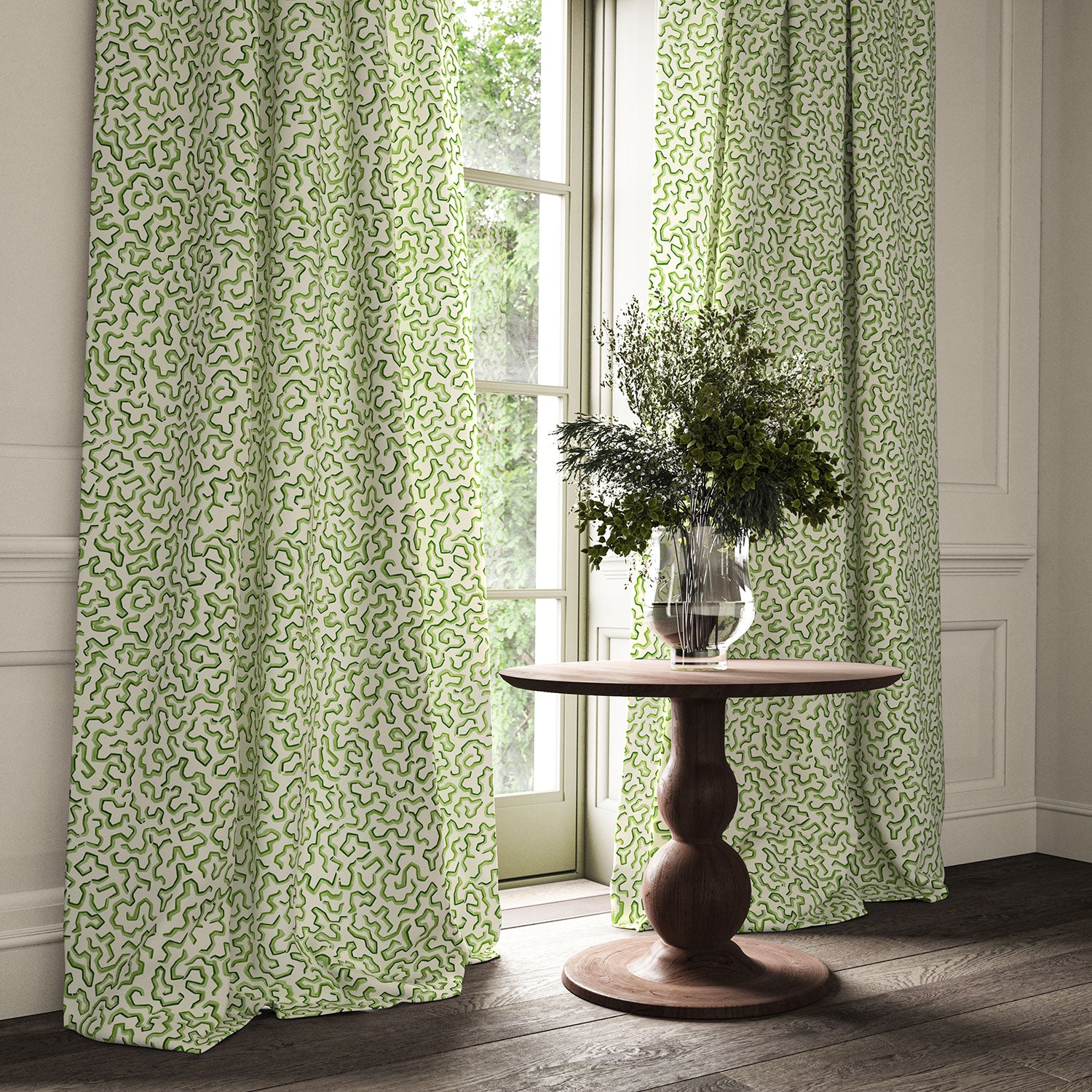 Curtains made from a printed linen fabric in green and off white featuring a feel of a classic animal print.