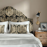 Headboard upholstered in a printed velvet fabric in brown and black featuring a Turkish kilim pattern.