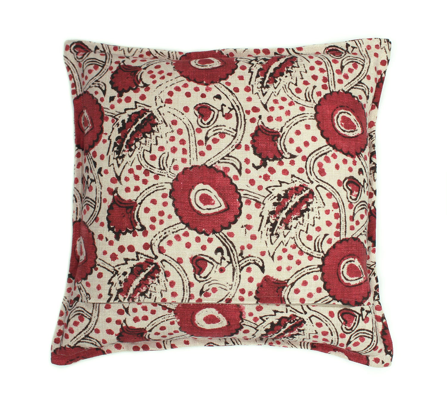 A red, black and cream linen cushion with a stylised floral pattern.