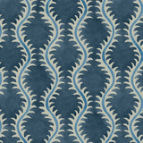 A printed linen fabric sample in blue and off white featuring a stylized fern pattern.