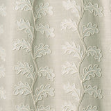Decorative oakleaf embroidery on a natural background.