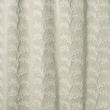 Decorative oakleaf embroidery on a natural background.