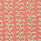 Decorative oakleaf embroidery on a coral background.