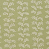White oakleaf embroidery pattern on a green background.