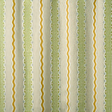 Patterned embroidered fabric with green and gold stripes on a beige background.