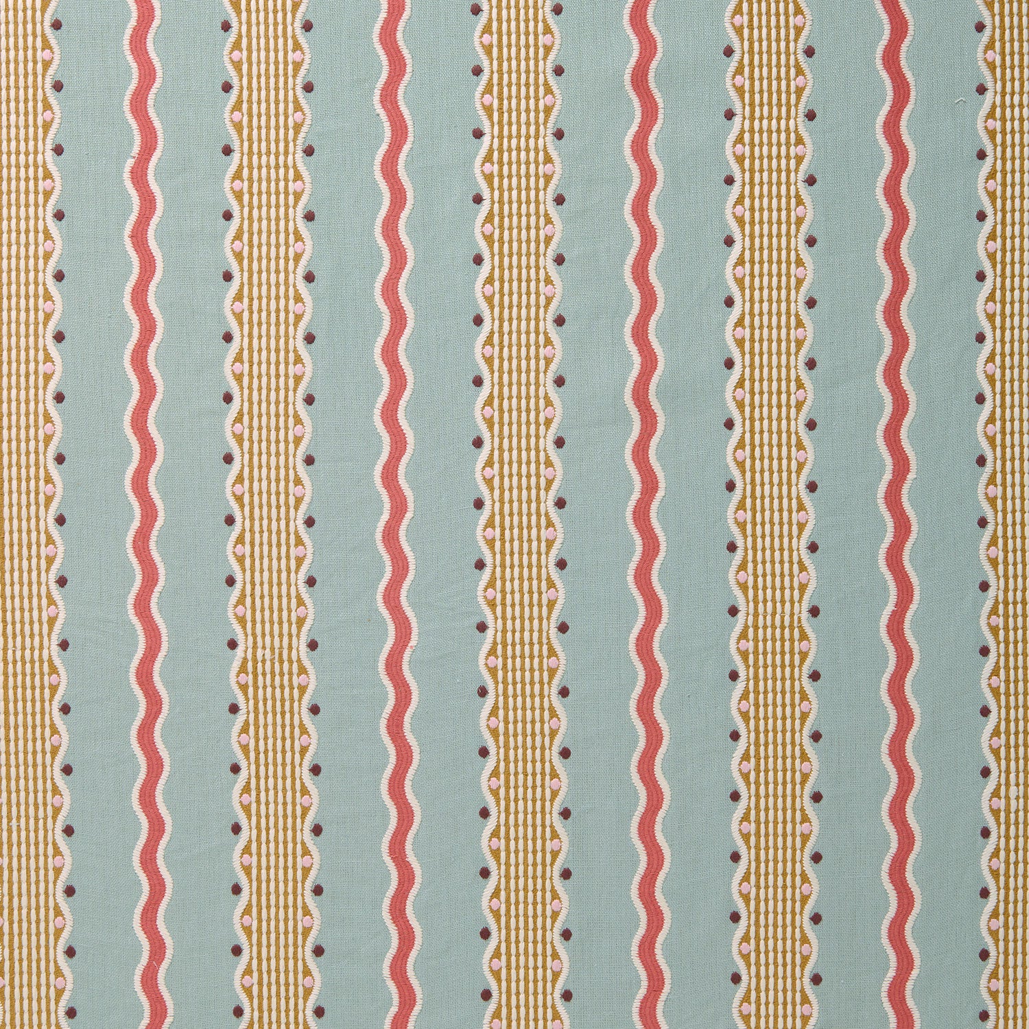 Embroidery fabric with vertical stripes in red, beige, and brown on a light blue background.