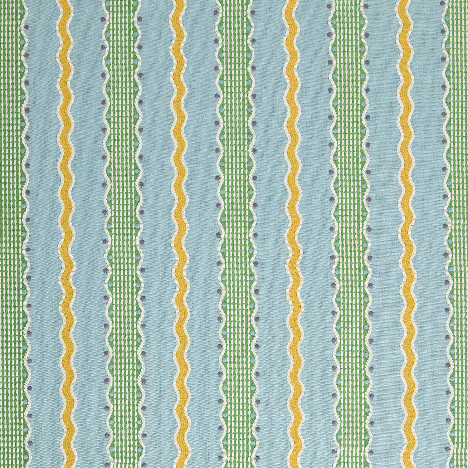 Embroidery fabric with green and yellow stripes on a blue background.