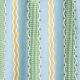 Embroidery fabric with green and yellow stripes on a blue background.