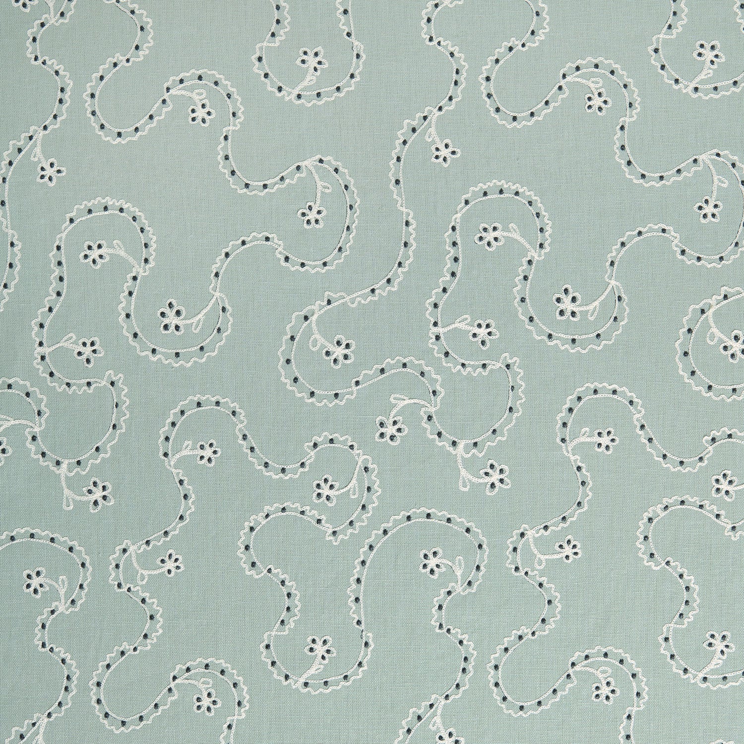 White embroidery pattern on a light blue background.