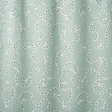 White embroidery pattern on a light blue background.