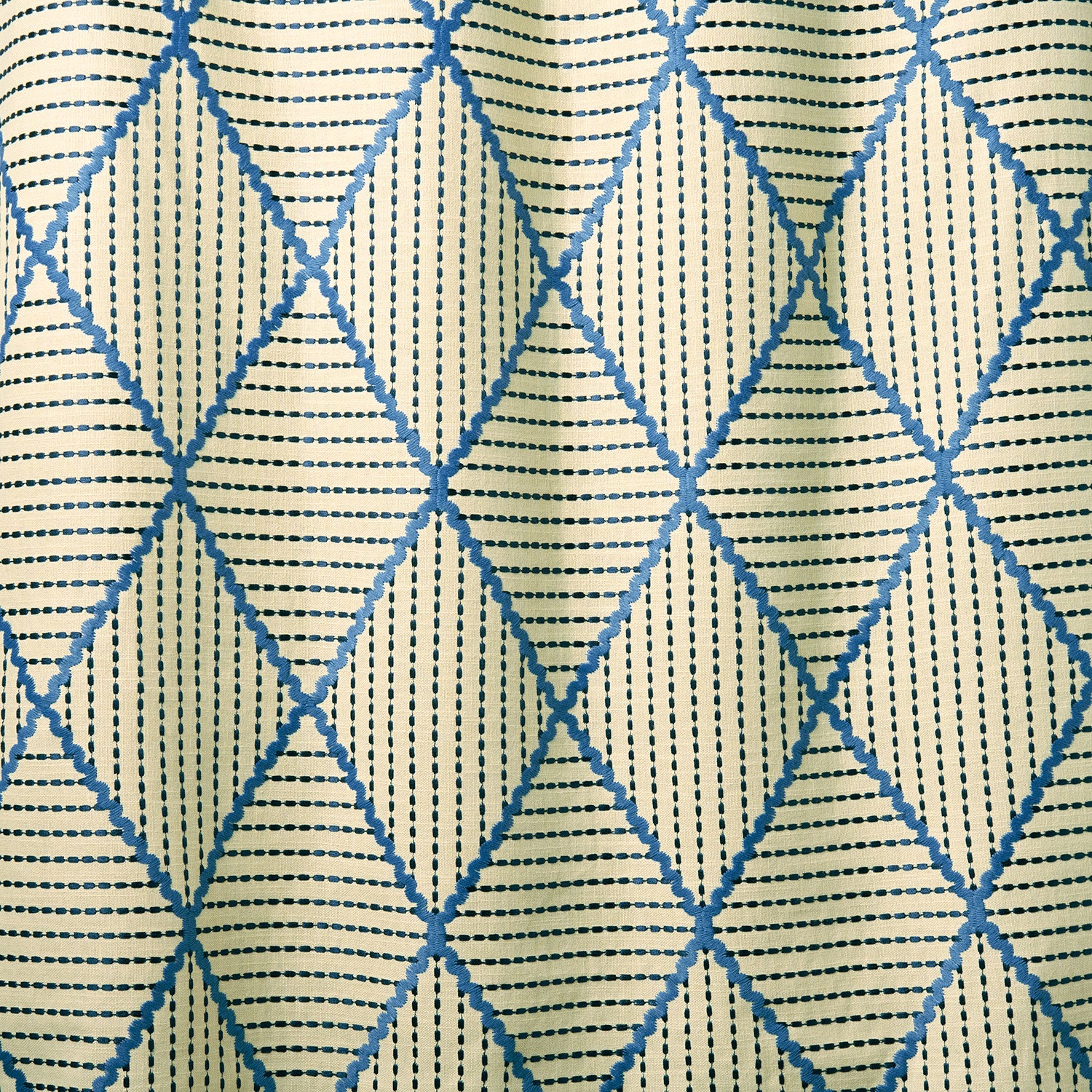 Geometric embroidery pattern with blue and beige lines on a textured background