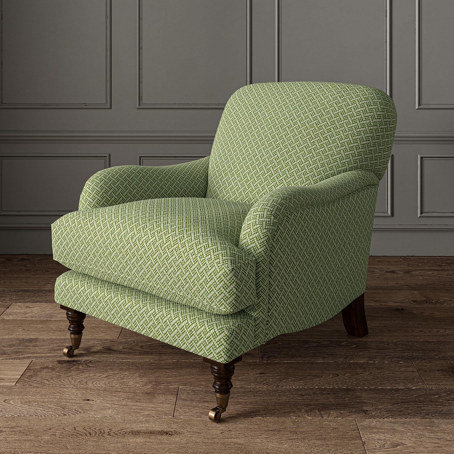 Chair upholstered in a green and off-white woven fabric featuring a trellis pattern.