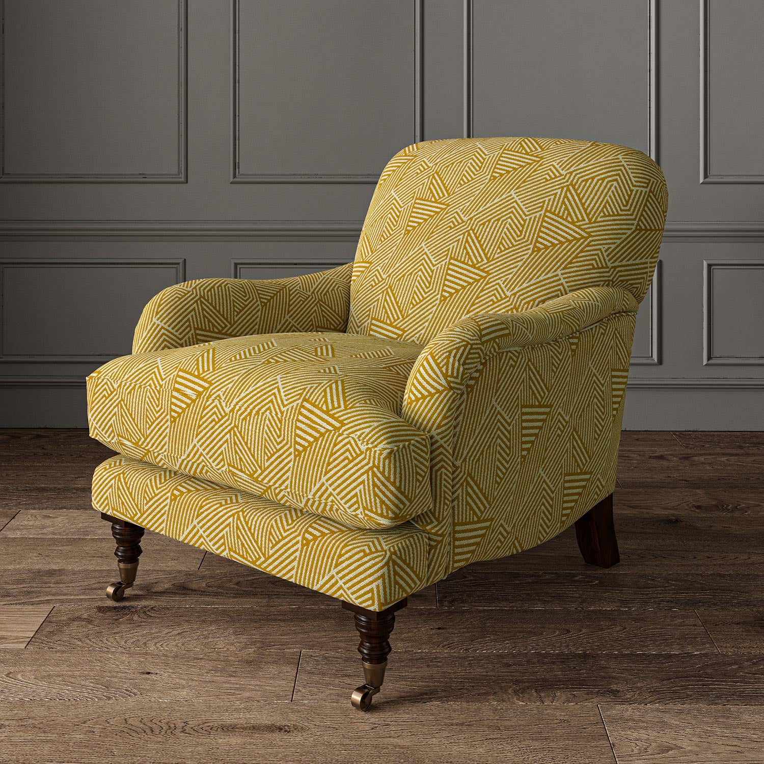 Chair upholstered in a yellow and off-white woven fabric featuring a geometric pattern.