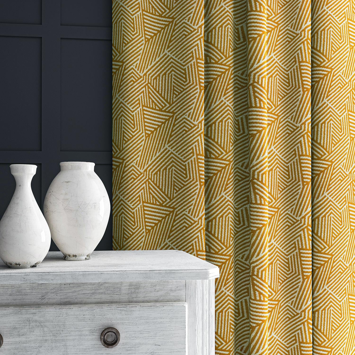 Curtain in yellow and off-white woven fabric featuring a geometric pattern.