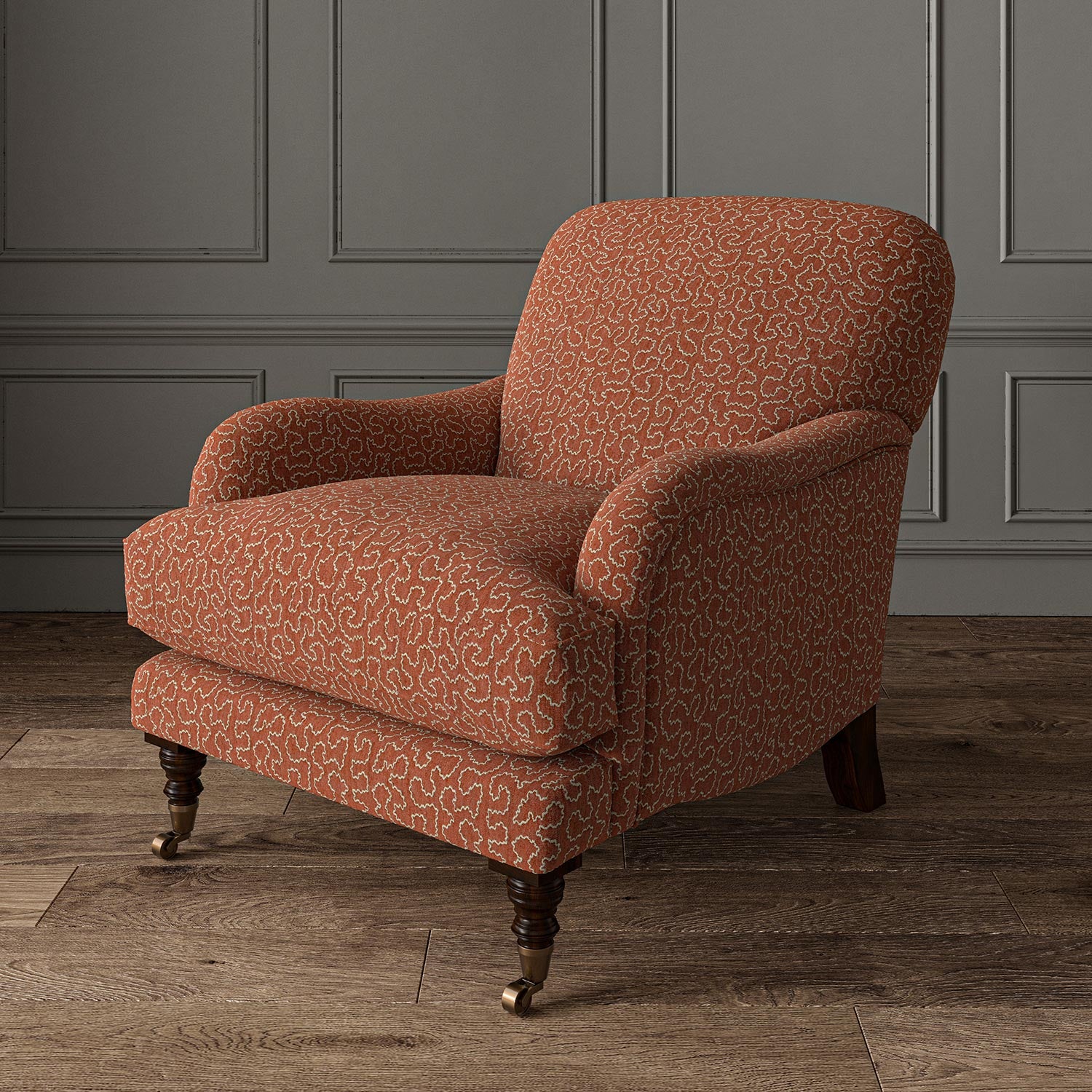 Chair upholstered in a red and off-white woven fabric featuring a wavy pattern.
