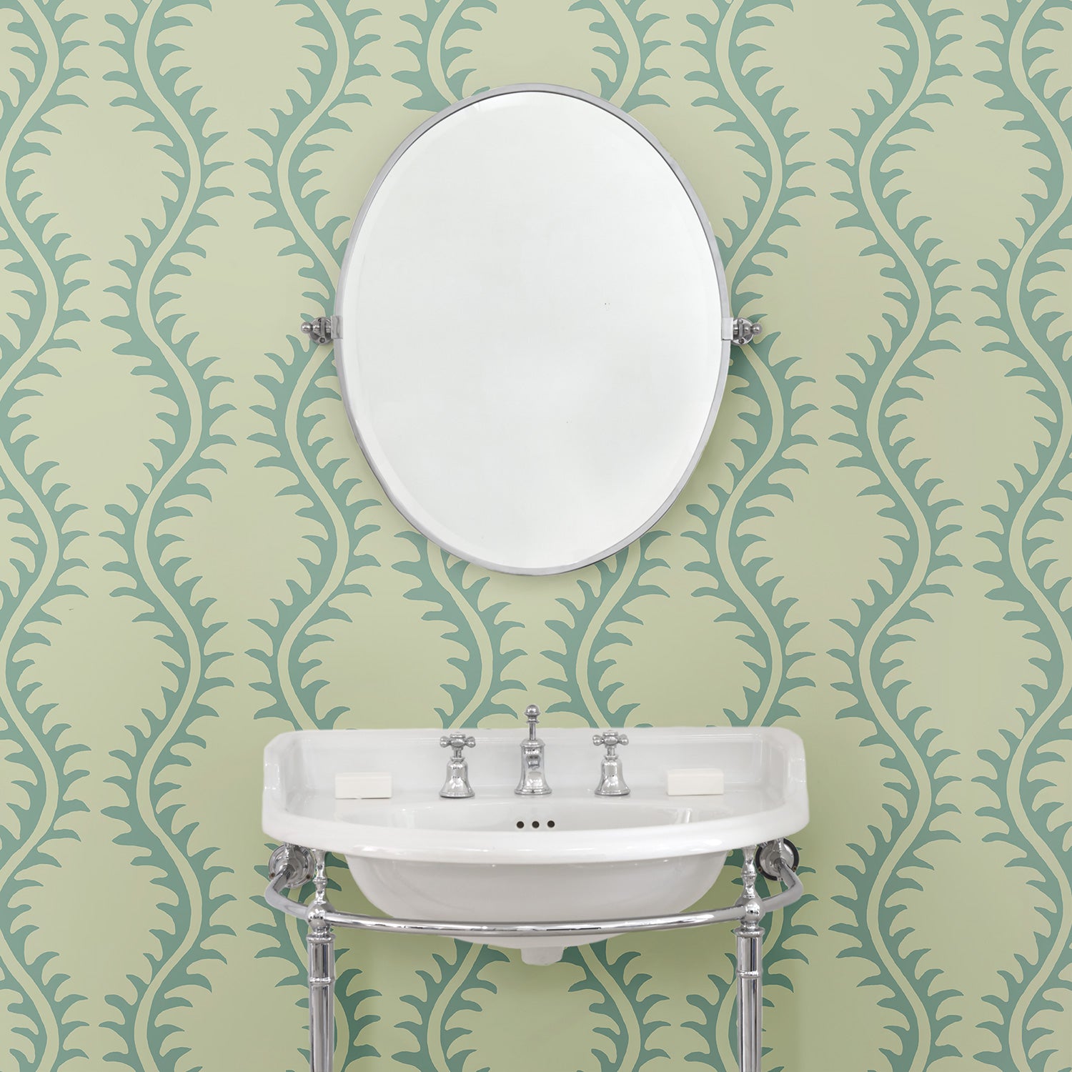 Luxurious wallpaper featuring stylised ferns and wavy lines in blue and cream.