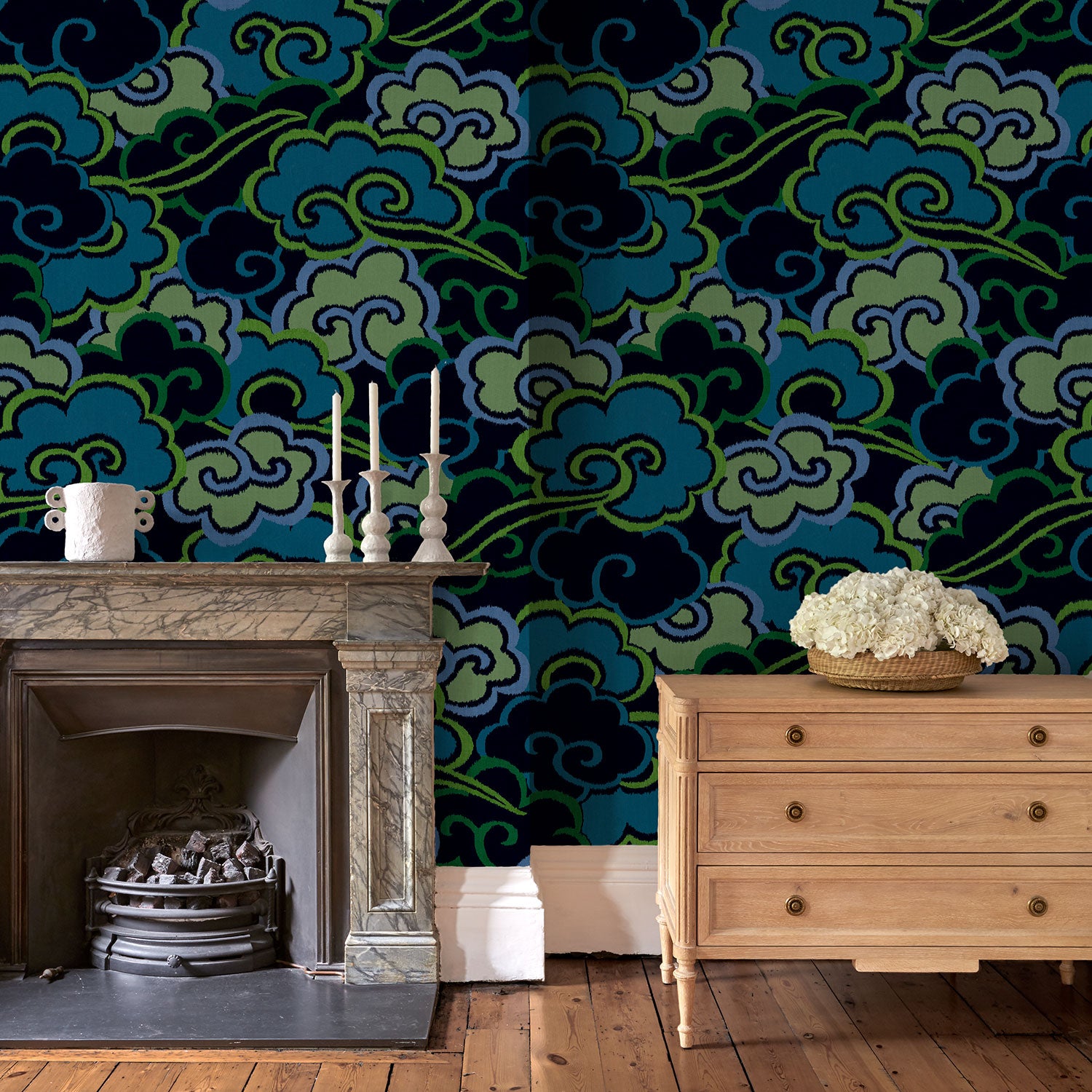 Inspired by a Japanese kimono, this designer wallpaper features an enchanting pattern of large abstract clouds.