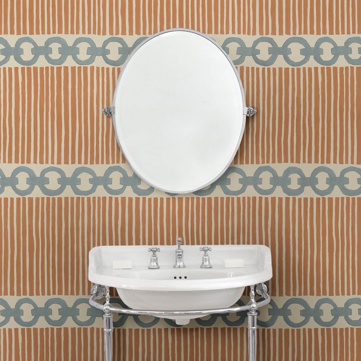 Bathroom with a chain-link wallpaper with different-sized blue and brown stripes.