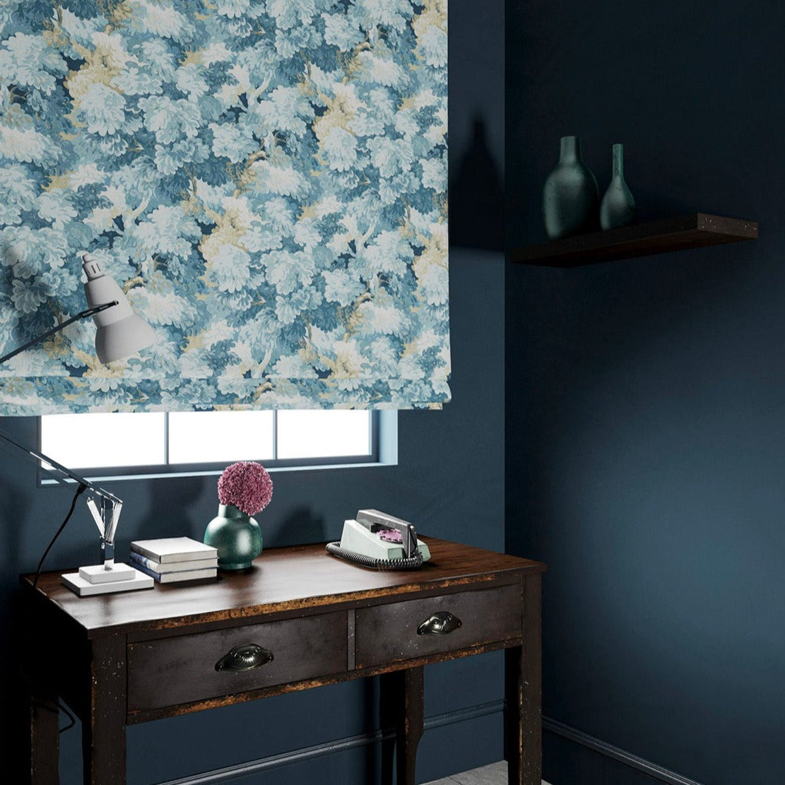 Blind made from a printed velvet fabric featuring a classic oak leaf design in green.