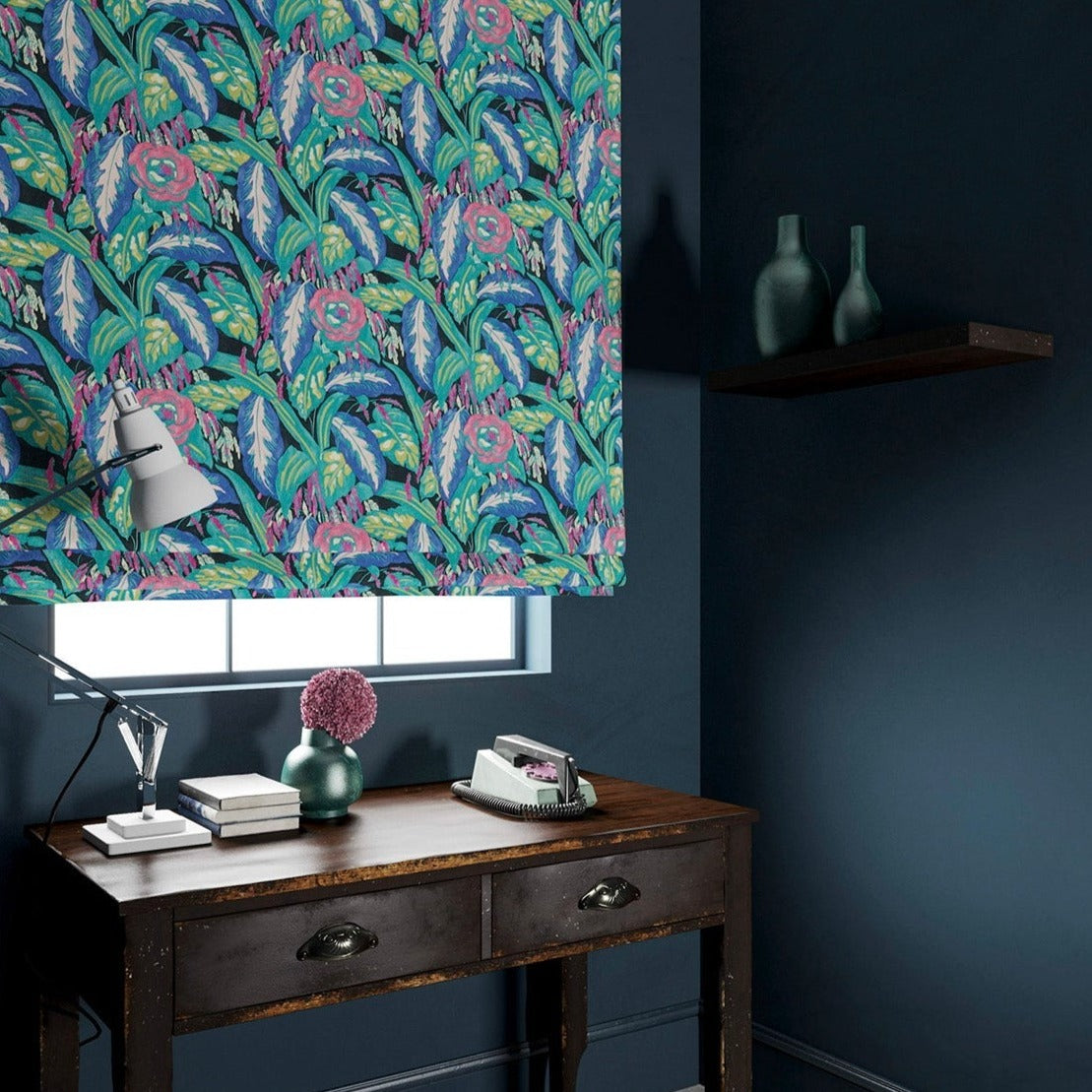 Blind in a floral-style printed velvet fabric in blues and greens.