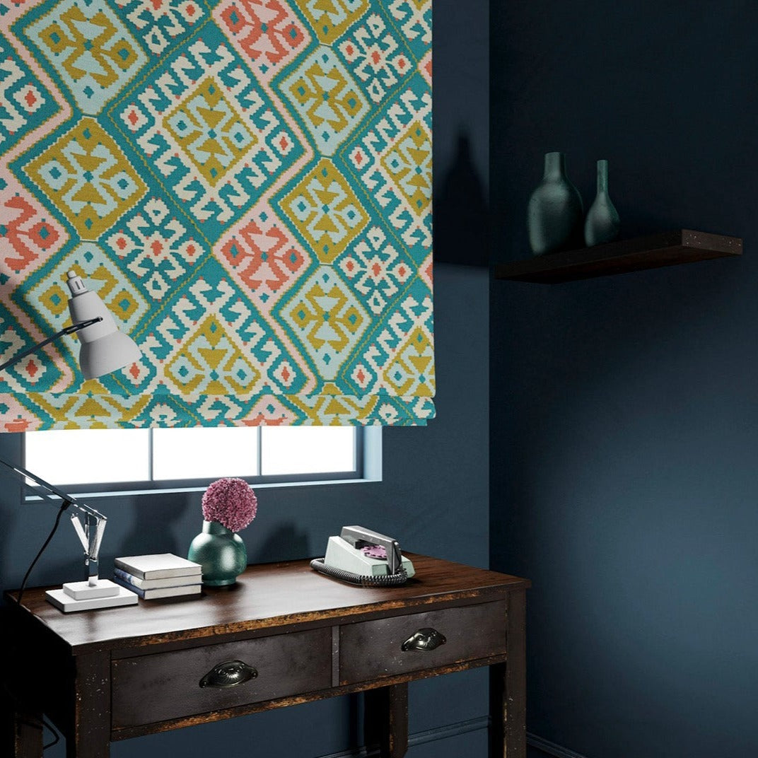 Velvet blind in a teal and peach kilim pattern.
