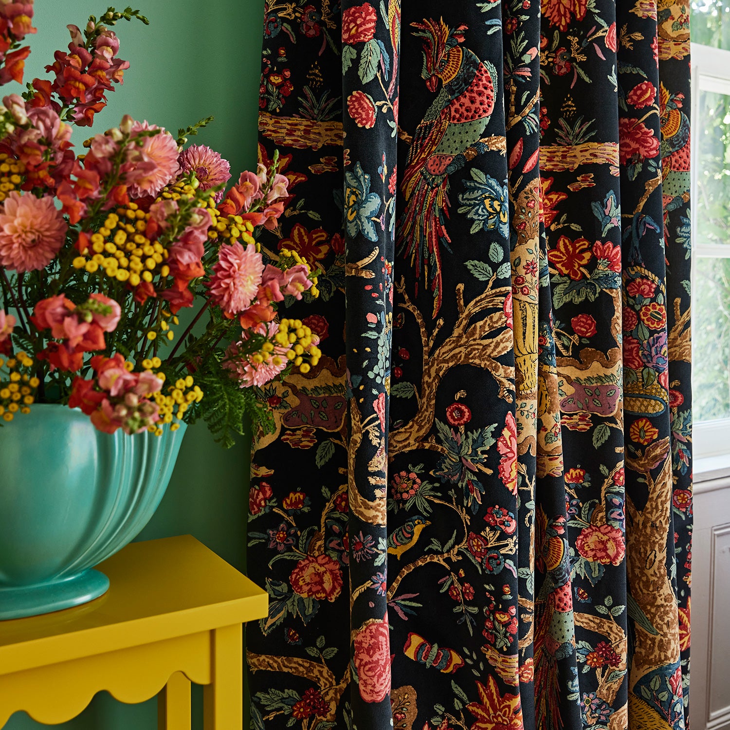 Velvet curtains showcasing a menagerie of parrots, lions, and alluring flowers in blue