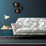 Velvet sofa upholstered in a grey and white velvet upholstery fabric with a wave design and stain resistant finish