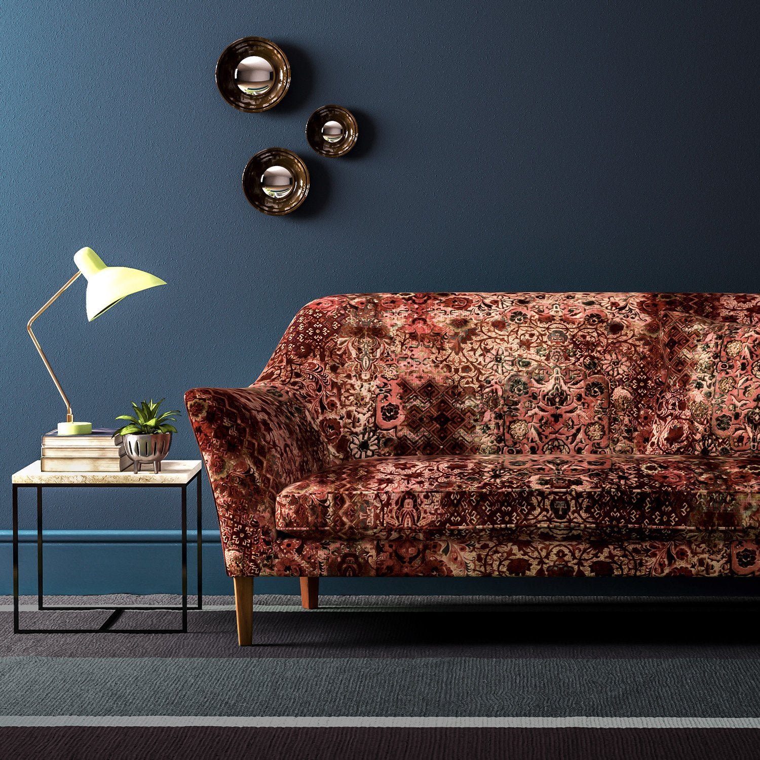 Sofa covered in a velvet upholstery fabric with an antique carpet-style design.