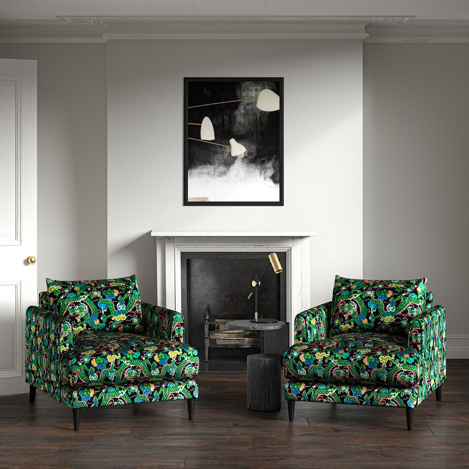 Velvet armchairs upholstered in a printed velvet fabric with a intricate mirror dragon design in green colours.