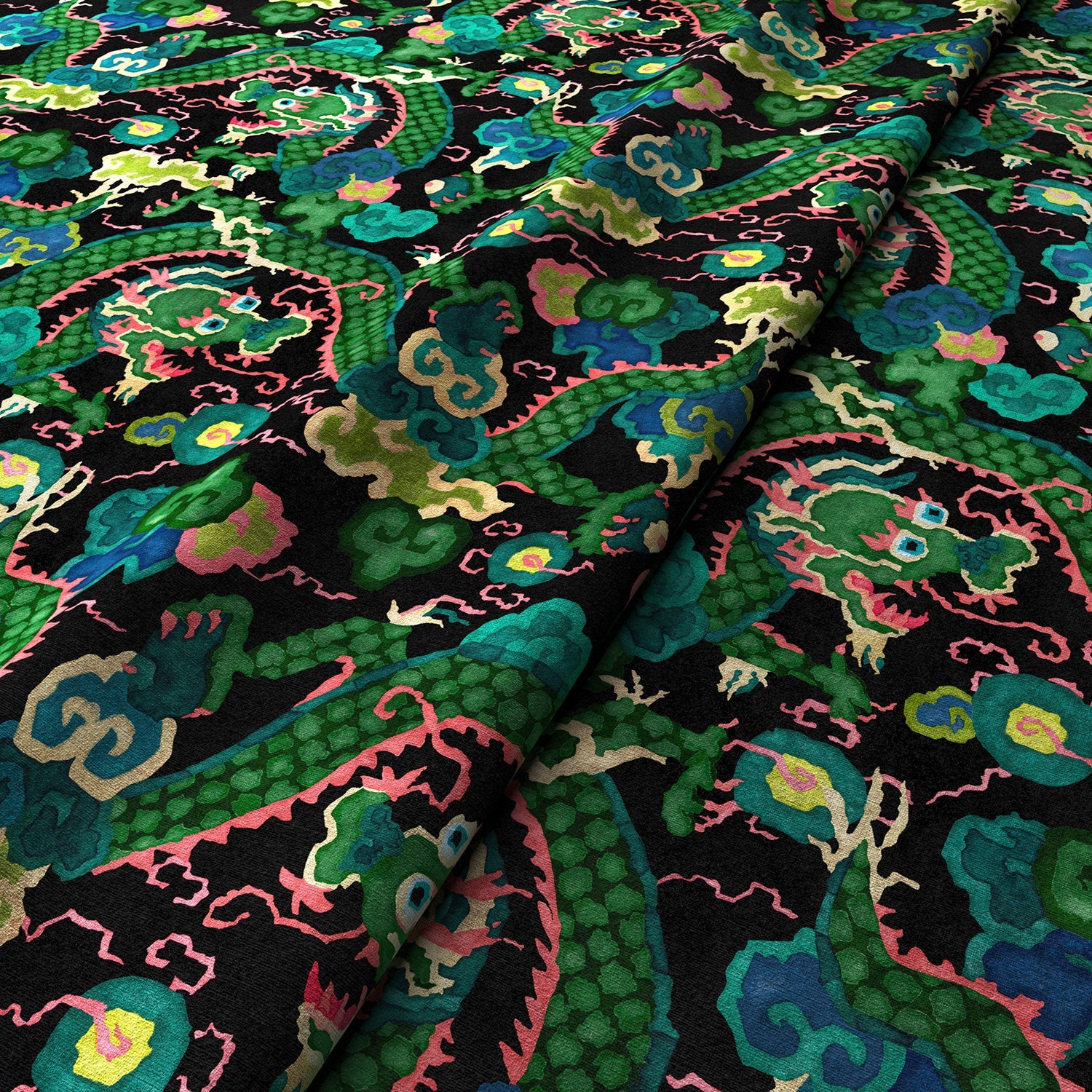 Printed velvet fabric with intricate mirror dragon design in green colours, for upholstery and curtain use.