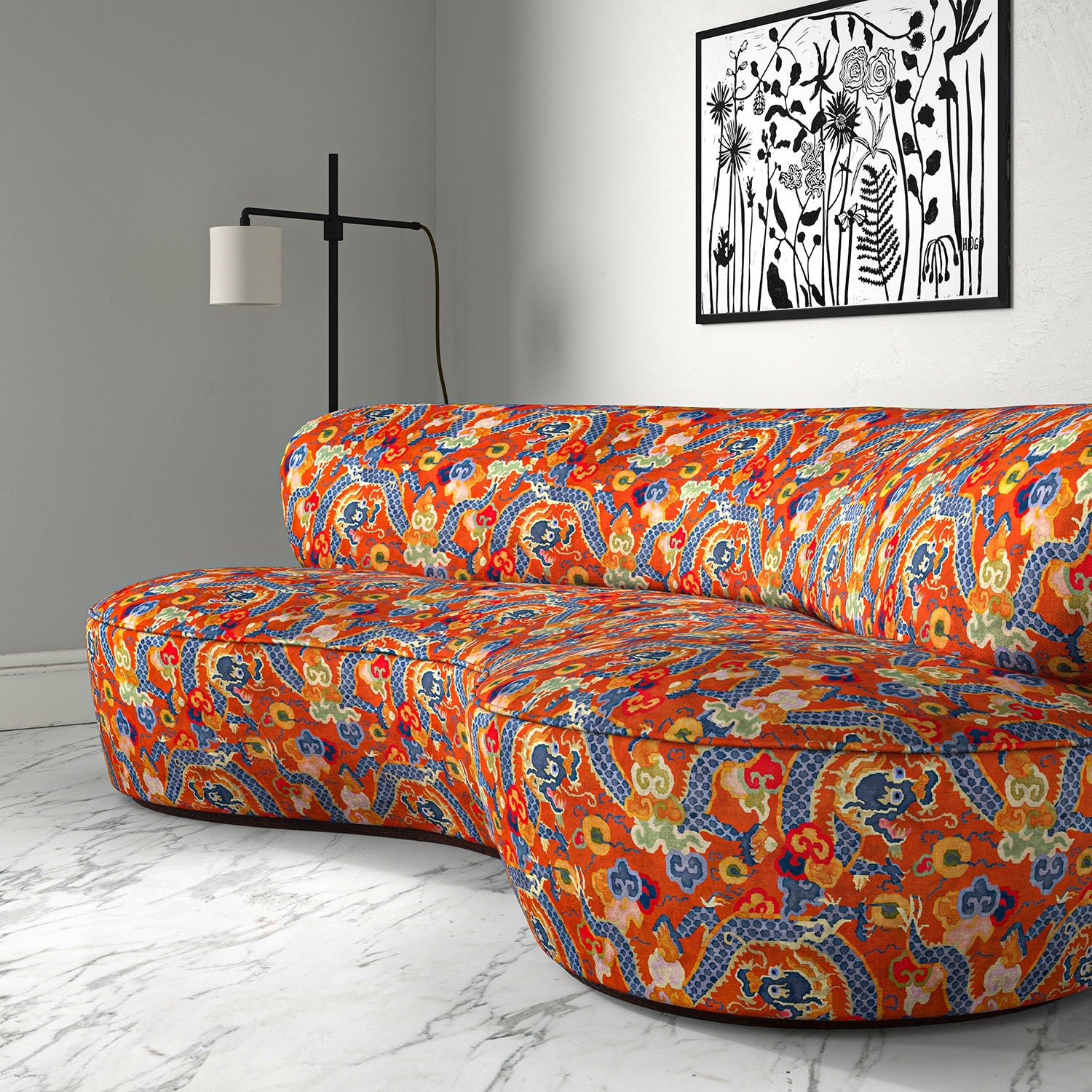 Velvet sofa upholstered in a printed velvet fabric with a intricate mirror dragon design in orange colours.