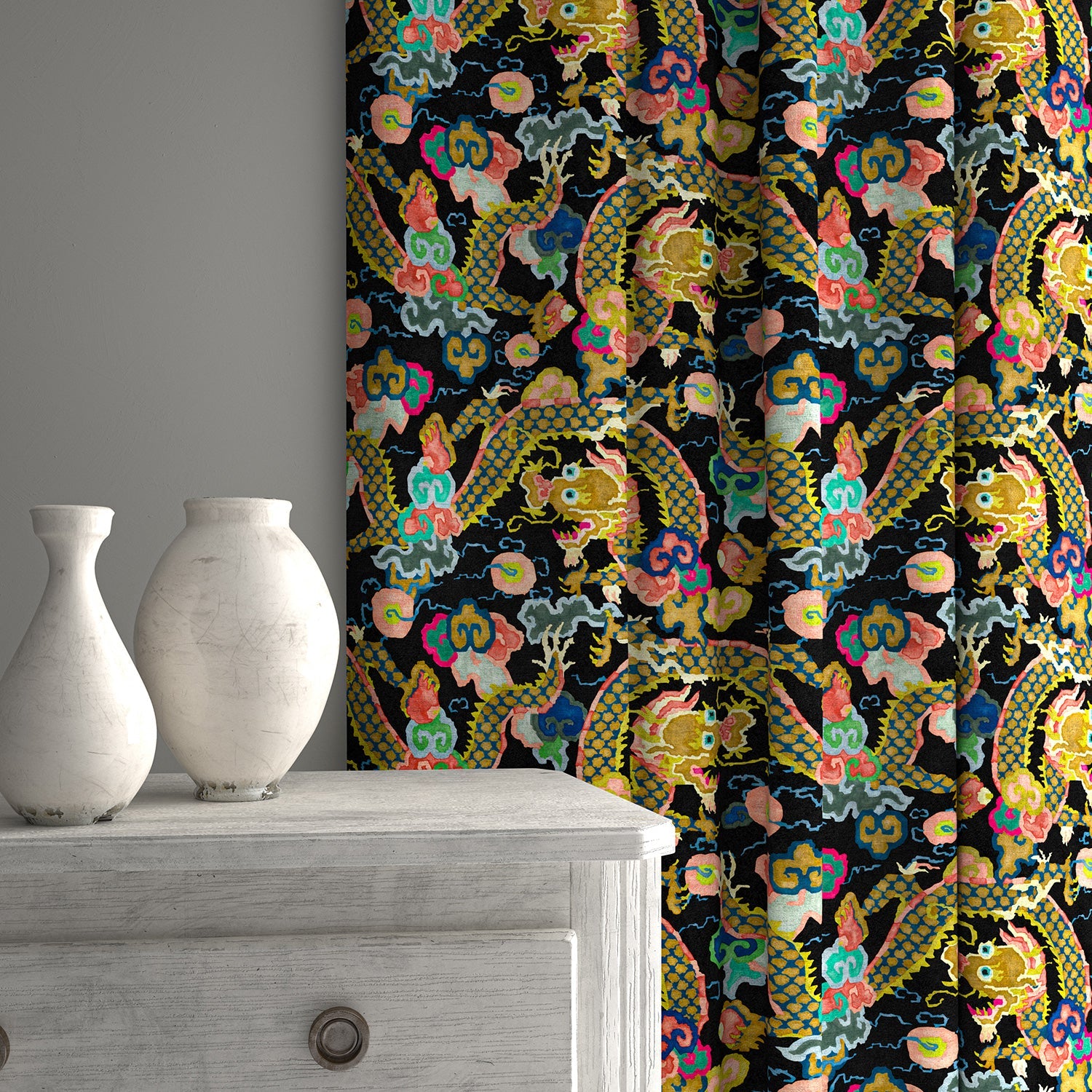 Velvet curtains upholstered in a printed velvet fabric with a intricate mirror dragon design in multicolours.