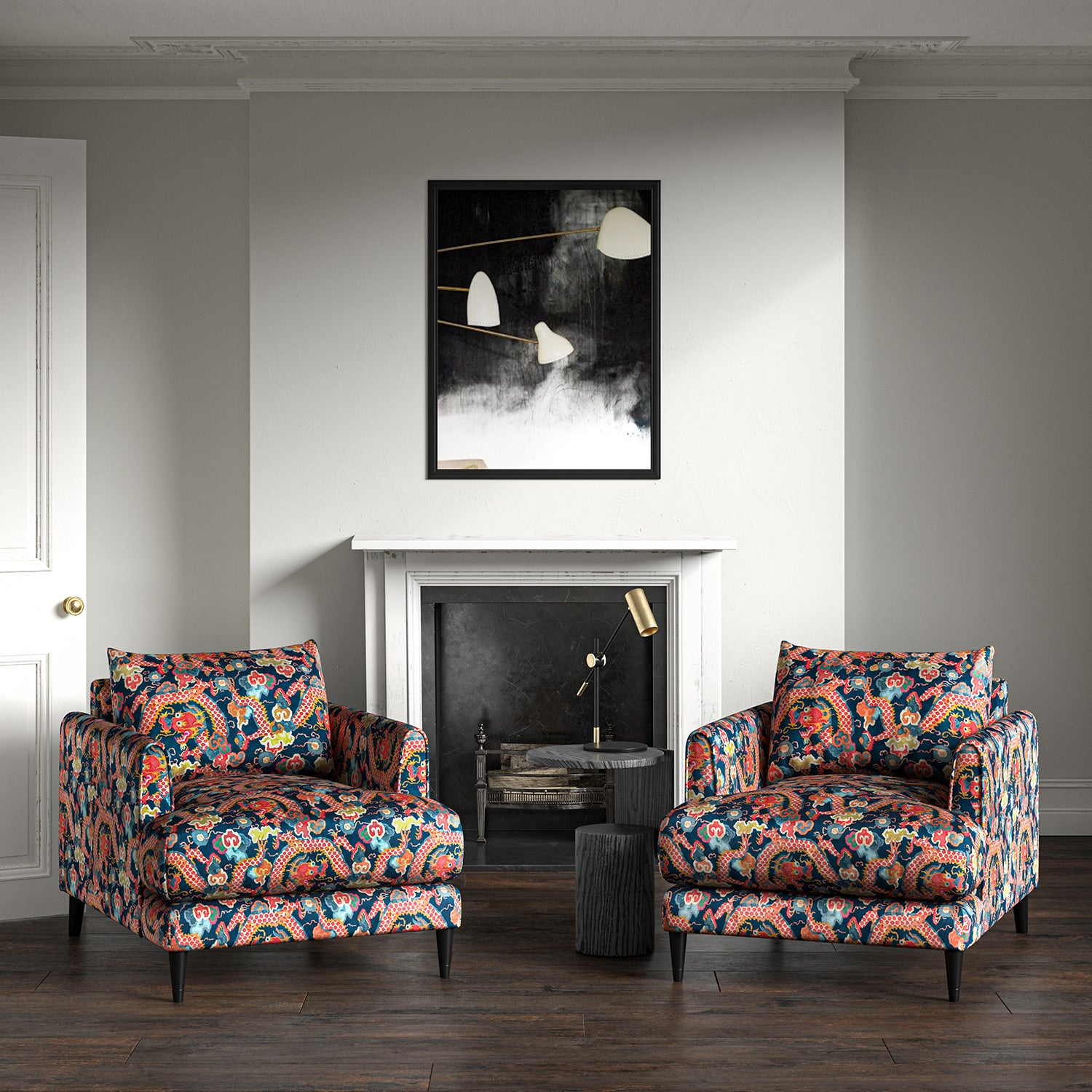 Velvet armchairs upholstered in a printed velvet fabric with a intricate mirror dragon design in blue and orange colours.