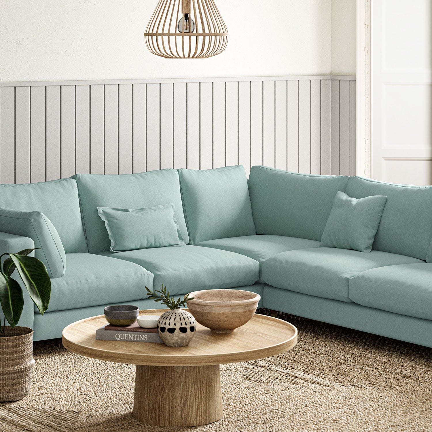 Sofa upholstered in Ice Blue linen fabric