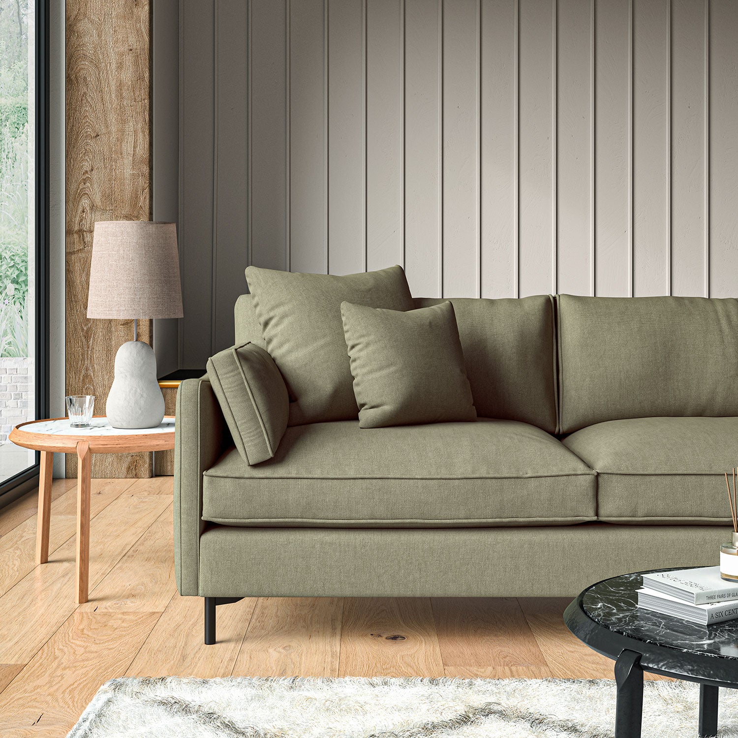 Sofa upholstered in Sage linen fabric