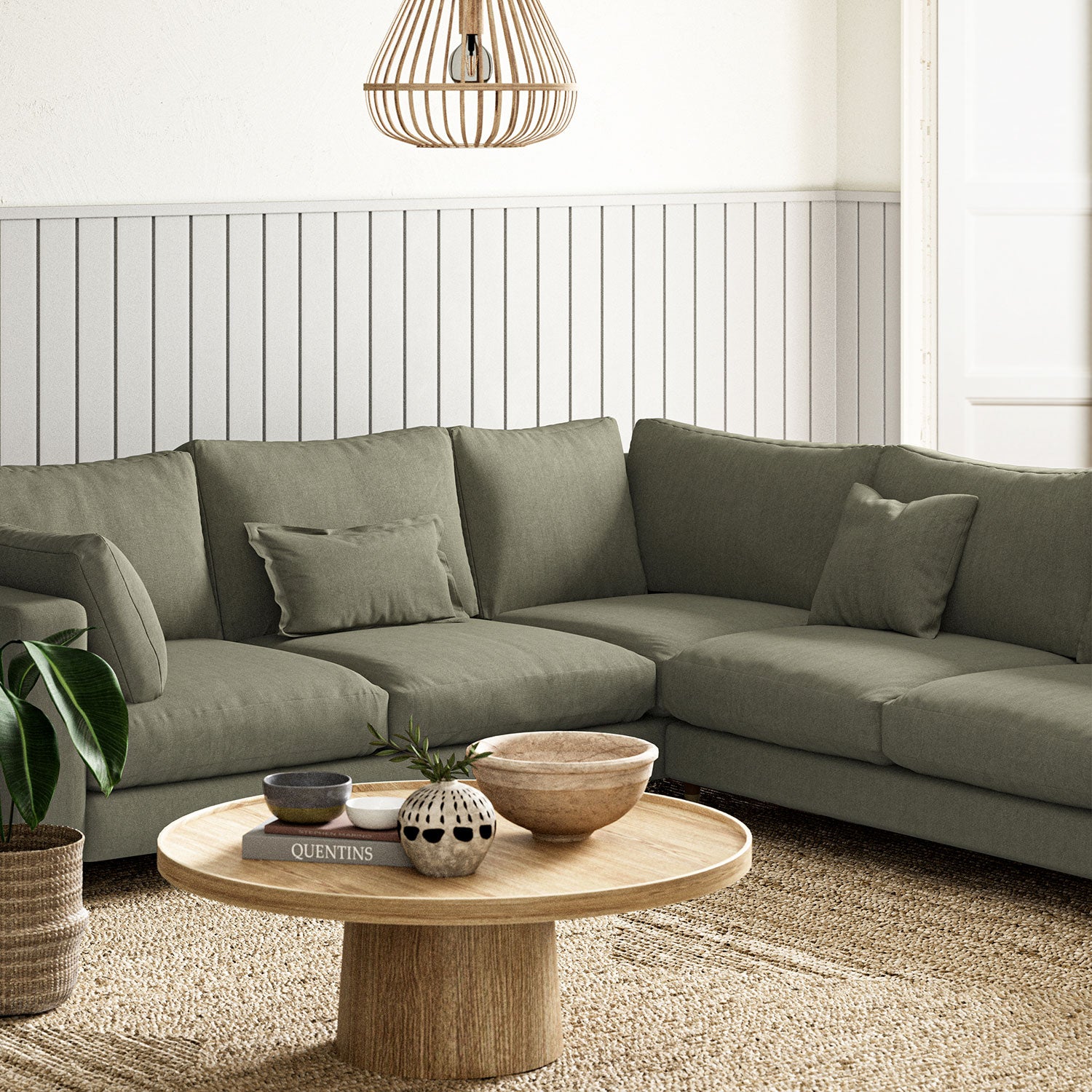Sofa upholstered in Sage linen fabric