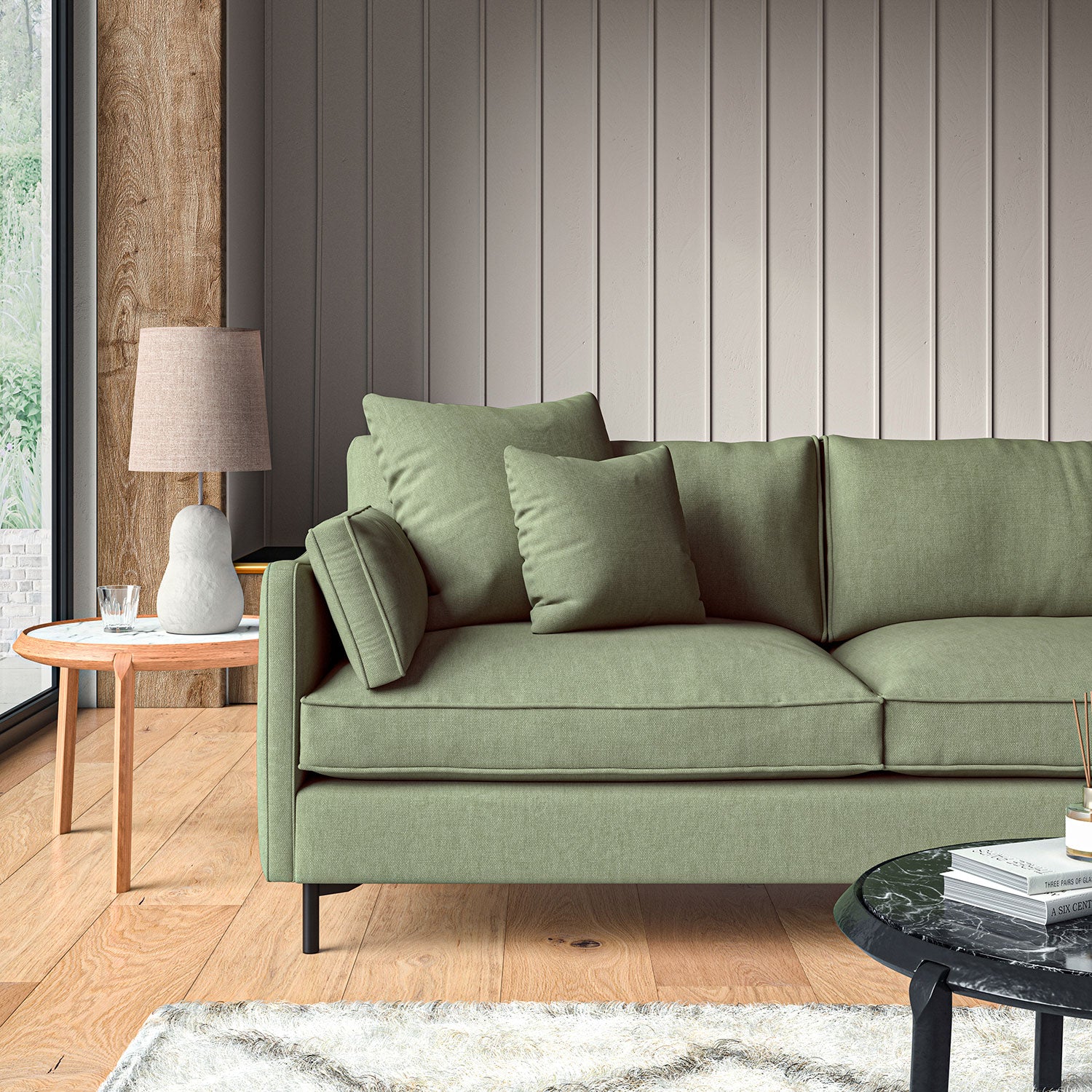 Sofa upholstered in Moss linen fabric